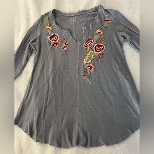 100% cotton designer tee, loosely fitted at waist, beautiful floral stitching.